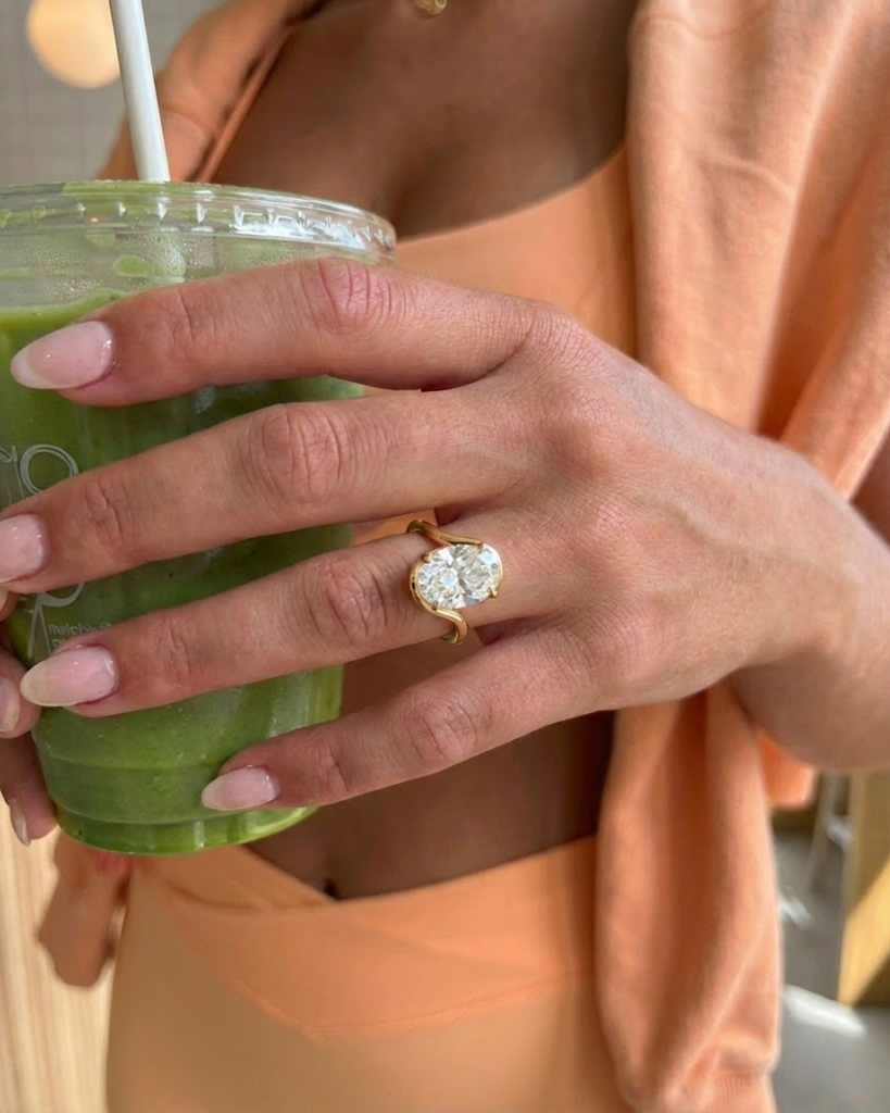 Oval Solitaire Swirl Bypass Ring